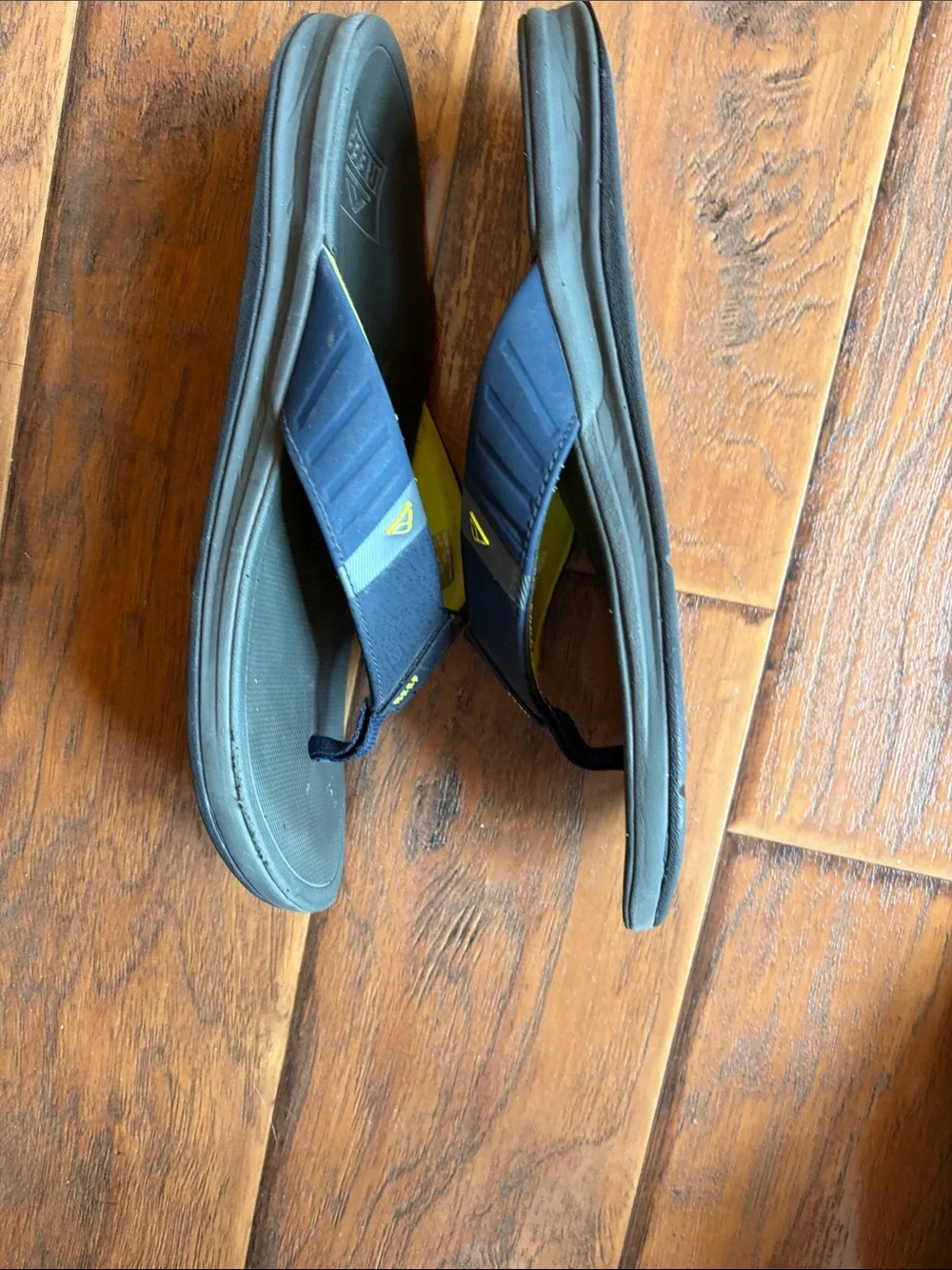 Reef Men’s Navy Flip Flops with Yellow Trim